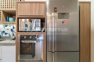 A cozinha ou kitchenette de 304 Bl 02 - WaldGarten Bombinhas - 50m do Mar e Frente Avenida - Condomínio de Alto Padrão - Piscina - Academia - Salão de jogos