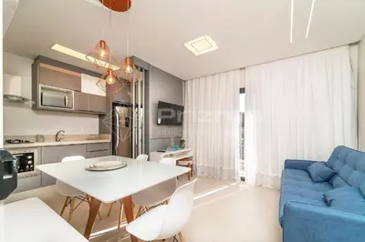 A cozinha ou kitchenette de 505 Bl 03 - WaldGarten Bombinhas - 50 m do Mar e Frente Avenida - Condomínio de Alto Padrão - Piscina - Academia - Salão de jogos