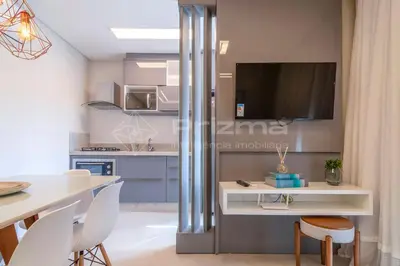 A cozinha ou kitchenette de 505 Bl 03 - WaldGarten Bombinhas - 50 m do Mar e Frente Avenida - Condomínio de Alto Padrão - Piscina - Academia - Salão de jogos
