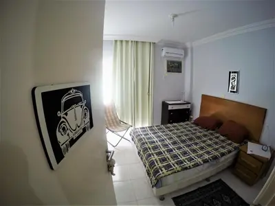 Uma cama ou camas num quarto em Apartamento Bombas