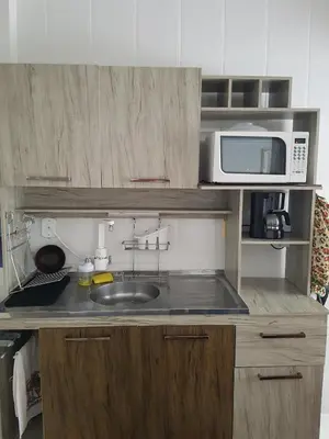 A cozinha ou kitchenette de Apartamento Bombas