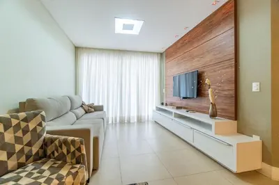 Uma televisão e/ou sistema de entretenimento em Boulevard - Apartamento em Condominio com Piscina