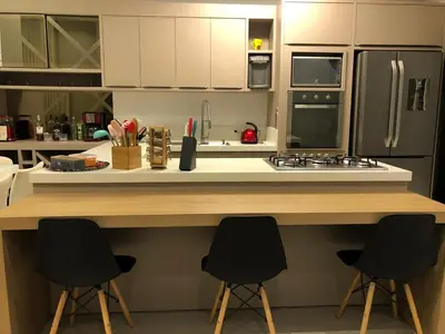A cozinha ou kitchenette de Casa de Férias com Piscina em Bombinhas