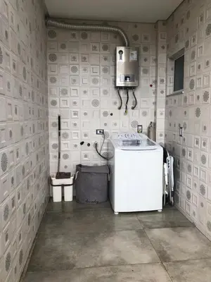 Uma casa de banho em Casa de Férias com Piscina em Bombinhas