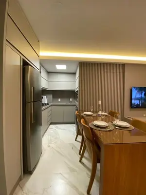 A cozinha ou kitchenette de Excelente AP Pé na areia Vista mar