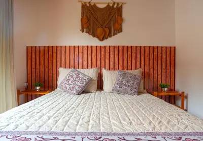 Uma cama ou camas num quarto em BC Praia Estaleiro - 2 Vagas, Ar, Churras e Pet OK