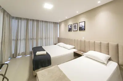 Uma cama ou camas num quarto em Casa Requinte, 4 suítes com Piscina Privativa, BC