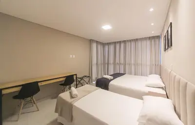 Uma cama ou camas num quarto em Casa Requinte, 4 suítes com Piscina Privativa, BC