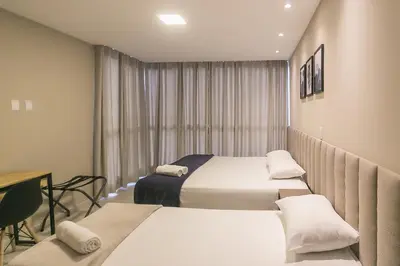 Uma cama ou camas num quarto em Casa Requinte, 4 suítes com Piscina Privativa, BC