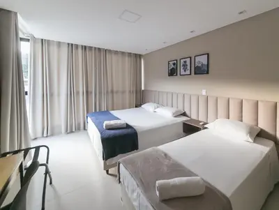 Uma cama ou camas num quarto em Casa Requinte Premium, 4 suítes com Piscina Privativa, Balneário Camboriú