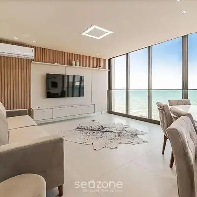 Apto moderno c/ vista mar a 75m da praia LLR802