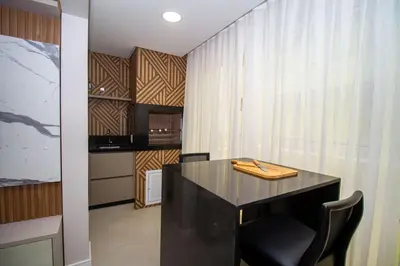 A cozinha ou kitchenette de Puntarenas 204 - Apto 2 suítes à 80 metros da Praia do Mariscal