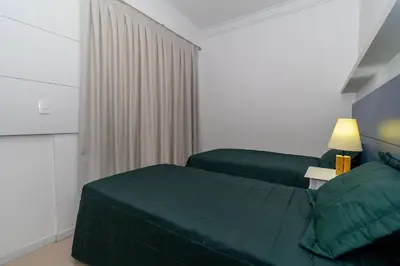 Uma cama ou camas num quarto em Cardeal 501C - Cobertura com 3 quartos e piscina privativa à 300 metros da Praia de Bombas!
