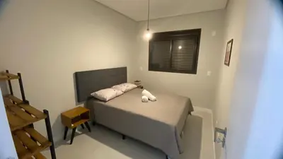 Uma cama ou camas num quarto em Gênova 204 Palmas