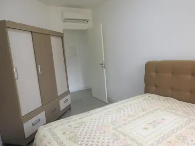 Uma cama ou camas num quarto em Apartamento Evora 300m da Praia