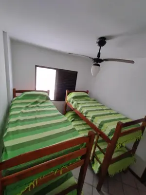 Uma cama ou camas num quarto em Sunny Bombas Larisa 104