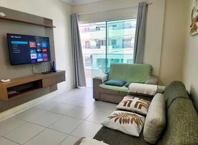 Uma televisão e/ou sistema de entretenimento em 101- Apartamento em Bombas