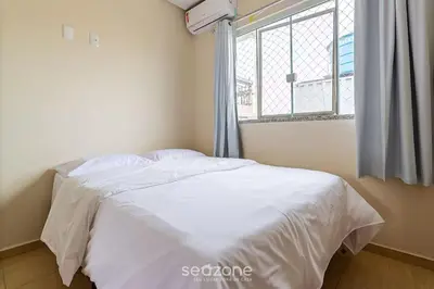 Uma cama ou camas num quarto em Casa 2Q c/ churrasq. 600m da praia RVL118
