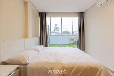 Uma cama ou camas num quarto em Casa 2Q c/ churrasq. 600m da praia RVL118