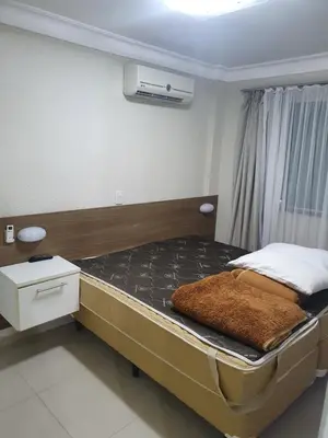 Uma cama ou camas num quarto em Summer Beach Bombinhas SC