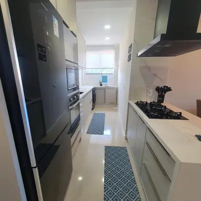 A cozinha ou kitchenette de Apartamento de Luxo com Piscina em Bombinhas