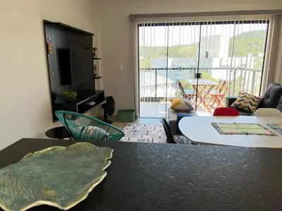 Uma área de estar em Surpreendente apto, 290 metros da praia!