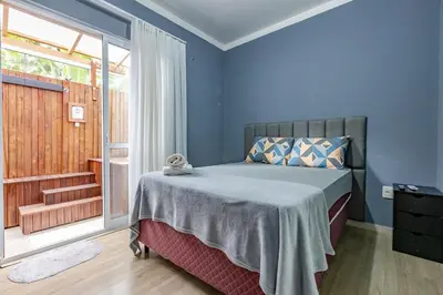 Uma cama ou camas num quarto em Apartamento 2 quartos com Spá Expocentro Praias