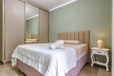 Uma cama ou camas num quarto em Apartamento 2 quartos com Spá Expocentro Praias