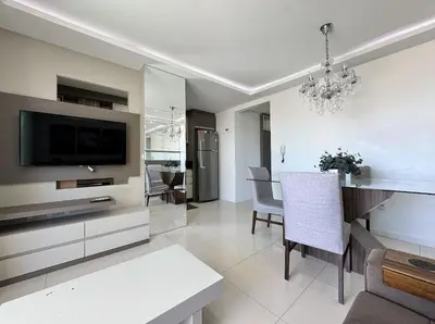 Uma televisão e/ou sistema de entretenimento em Residencial Luize 302 - Apto para 7 pessoas na Praia de Palmas a 350m do mar