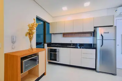 A cozinha ou kitchenette de Apartamento pertinho da Praia de Bombinhas