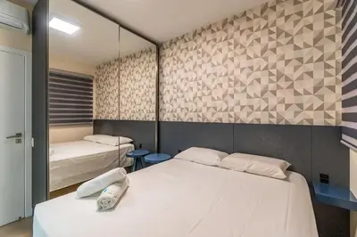 Uma cama ou camas num quarto em Luxuoso Apartamento em Condomínio com Piscina e Lazer