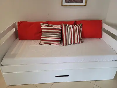 Uma cama ou camas num quarto em Apartamento com 2 quartos no centro de Tijucas 105