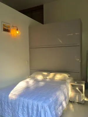 Uma cama ou camas num quarto em casa natureza Mariscal