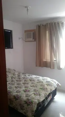 Uma cama ou camas num quarto em Apto quadra no Hard Rock 30m do mar