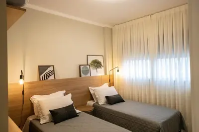Uma cama ou camas num quarto em Luxo em Mariscal - 2 Suítes