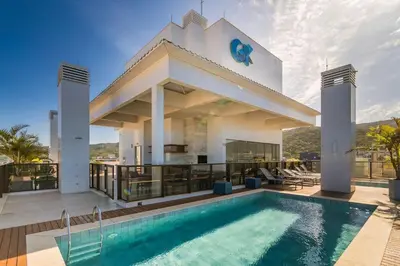 A piscina em ou perto de Aluguel Moderno Apartamento 3 quartos