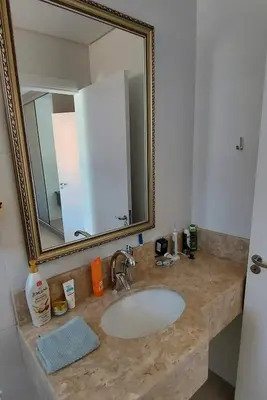 Uma casa de banho em Amplo apto 3 suítes