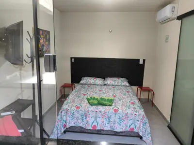 Uma cama ou camas num quarto em Casa de Praia Família Próximo ao ExpoCentro BC