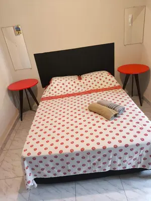 Uma cama ou camas num quarto em Casa de Praia Família Próximo ao ExpoCentro BC