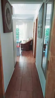 Uma cama ou camas num quarto em Casas de Aluguel da Lulu
