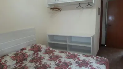 Uma cama ou camas num quarto em Duplex Costa Esmeralda