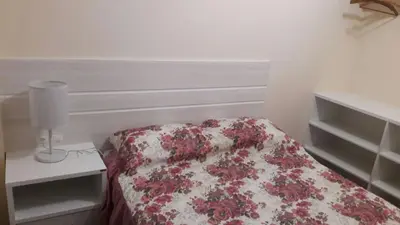 Uma cama ou camas num quarto em Duplex Costa Esmeralda