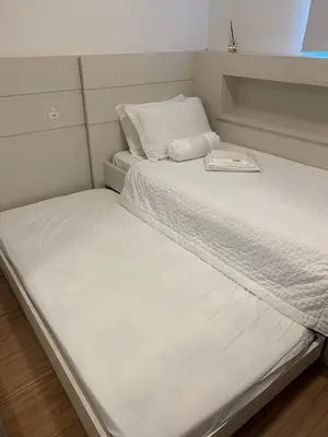 Uma cama ou camas num quarto em Encanto dos Mares - Apartamento premium 4