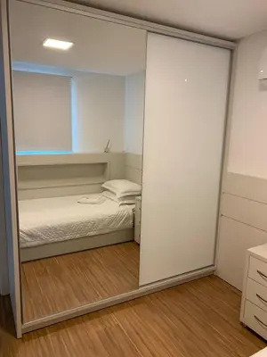 Uma cama ou camas num quarto em Encanto dos Mares - Apartamento premium 4
