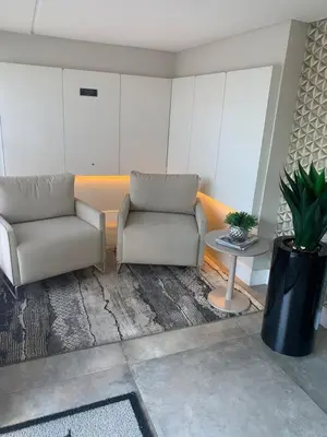 Uma área de estar em Encanto dos Mares - Apartamento premium 4