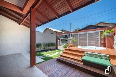 A piscina em ou perto de Casa com 02 dormitórios e jacuzzi aquecida