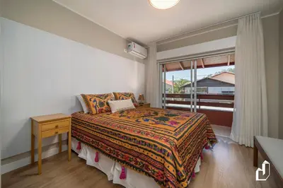 Uma cama ou camas num quarto em Casa com 02 dormitórios e jacuzzi aquecida