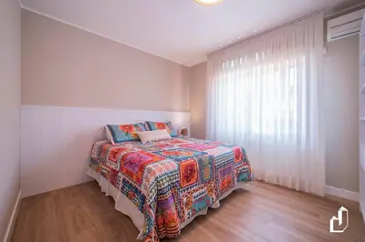 Uma cama ou camas num quarto em Casa com 02 dormitórios e jacuzzi aquecida