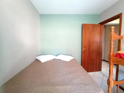 Uma cama ou camas num quarto em CDB-206 Dpto a 100 metros del mar en Bombas