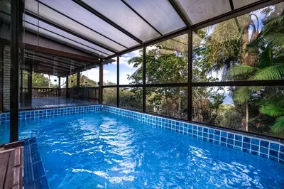 A piscina em ou perto de Casa 2, 3 ou 4 pessoas vista incrível com piscina centro Bombinhas carro 4x4 ou potente